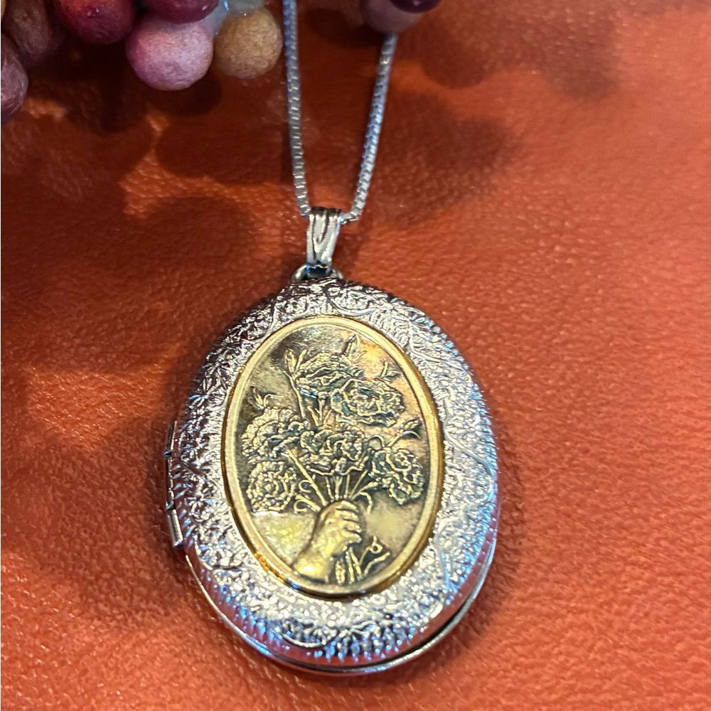 Two Tone Oval Shape Locket w/Hand Holding a Bouquet of Flowers Pendant